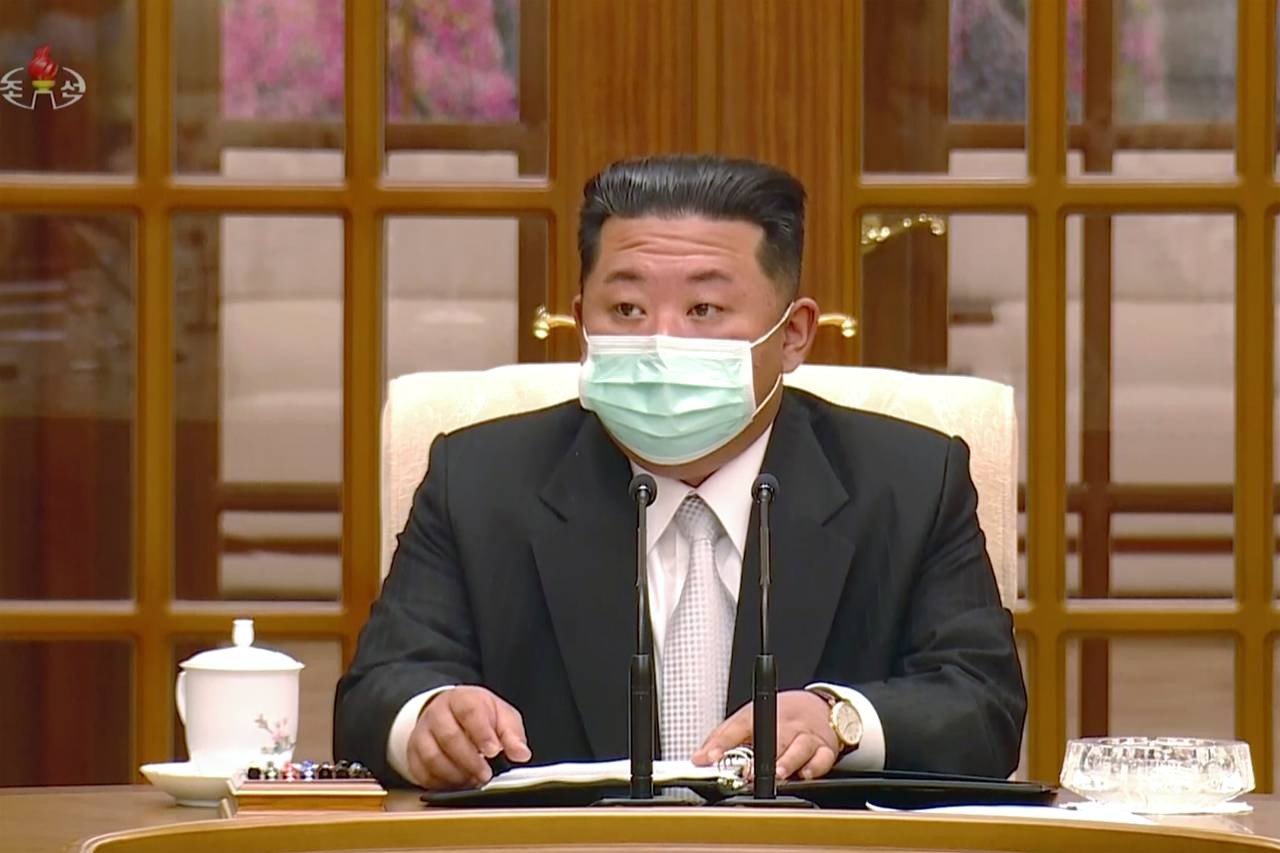Kim Jong Un med munnbind.