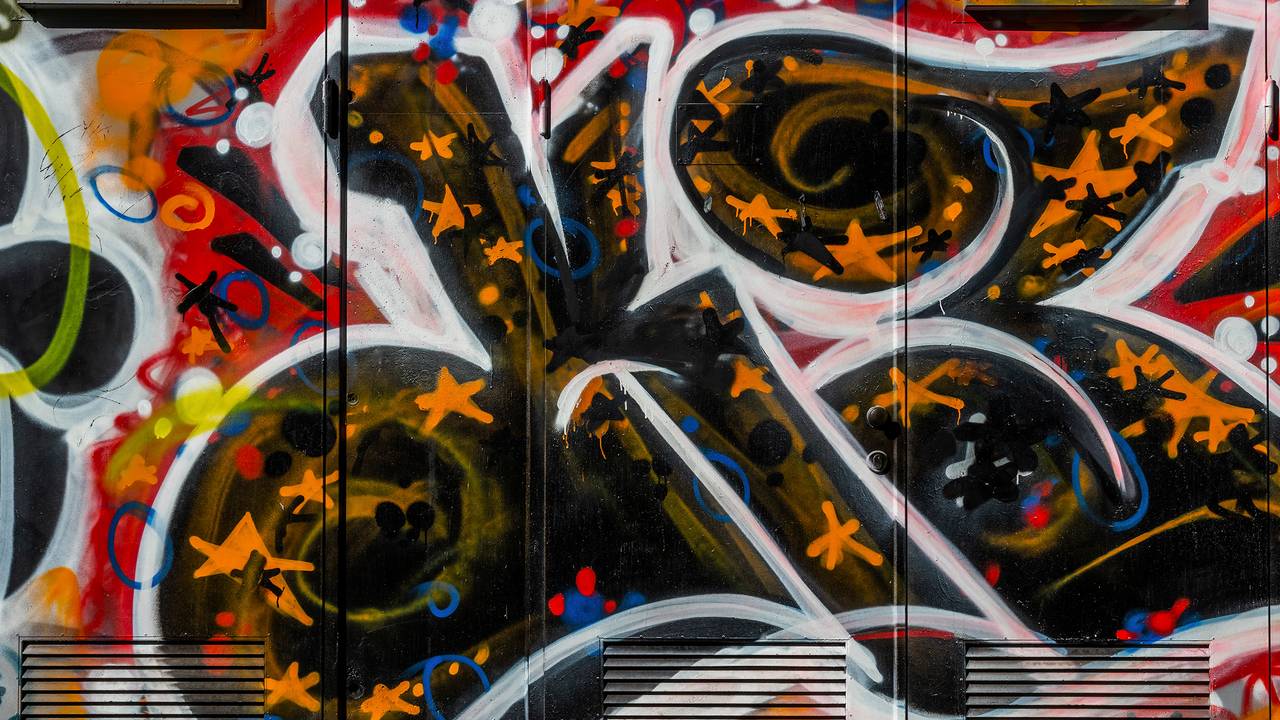 Grafitti på en vegg langs Akerselva i Oslo.