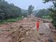 Reuters A firefighter stands on the soil after a landslide caused by torrential rains, in Sancheong, South Korea, July 19, 2025. Yonhap via REUTERS THIS IMAGE HAS BEEN SUPPLIED BY A THIRD PARTY. NO RESALES. NO ARCHIVES. SOUTH KOREA OUT. NO COMMERCIAL OR EDITORIAL SALES IN SOUTH KOREA.