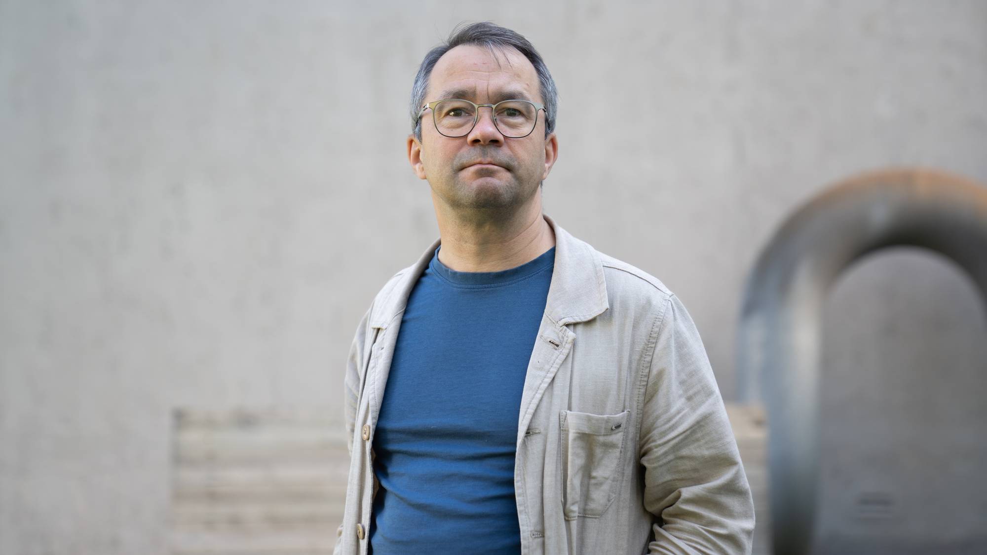 Portrett av Lars Peder Haga, en mann med briller