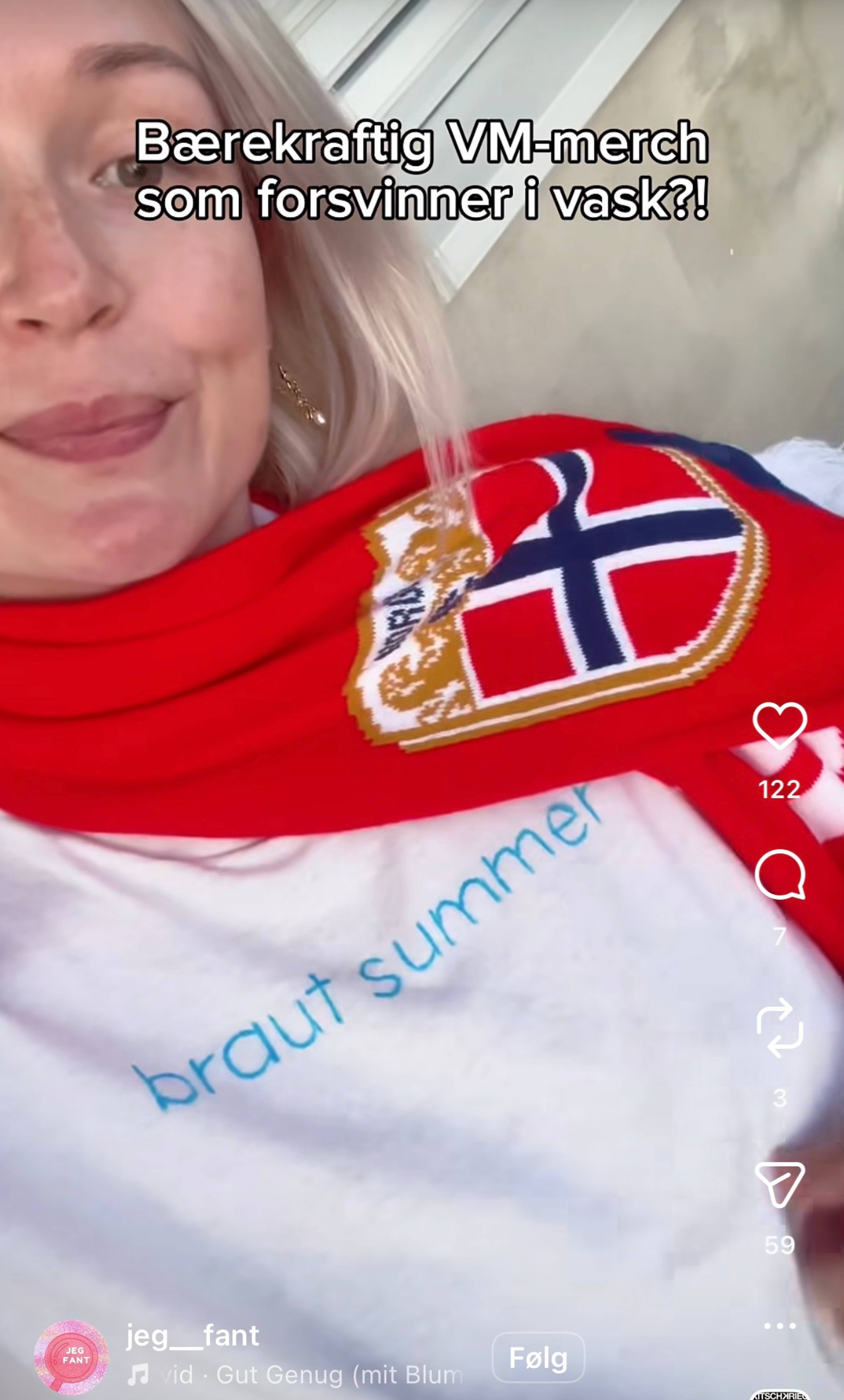 Kvinne med norsk flagg rundt halsen og hvit t-skjorte hvor det står "Braut summer"