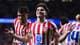 Manu Fernandez / AP,NTB Fotballspiller i Atletico Madrid-drakt feirer mål. En medspiller står bak. Begge er iført stripete drakt. Tribuner ses i bakgrunnen. (Bildebeskrivelsen er laget av en KI-tjeneste)