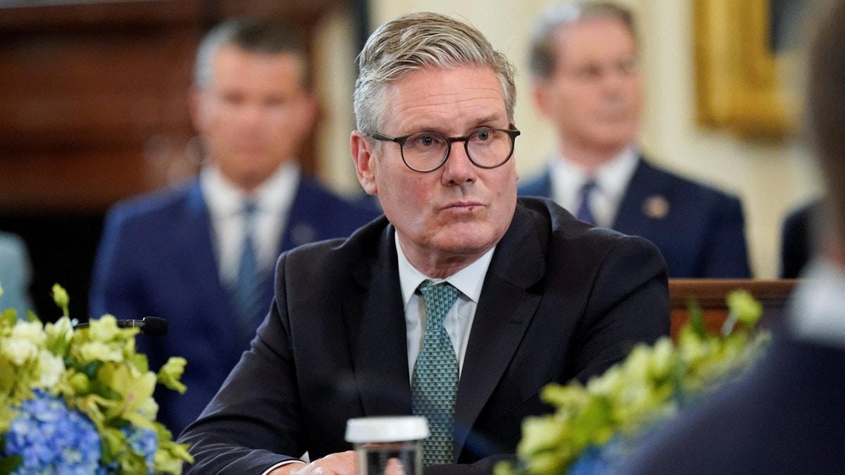 Britain's Prime Minister Keir Starmer attends a meeting with U.S. President Donald Trump, Ukrainian President Volodymyr Zelenskiy and other European leaders amid negotiations to end the Russian war in Ukraine, at the White House in Washington, D.C., U.S., August 18, 2025. REUTERS/Al Drago