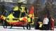 Photo: Elvis Piazzi / AP / NTB A group of people standing around a yellow helicopter on a snowy mountain