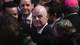 Luisa Gonzalez / REUTERS,NTB FIFA-president Gianni Infantino i en folkemengde omgitt av andre personer i dress. (Bildebeskrivelsen er laget av en KI-tjeneste)
