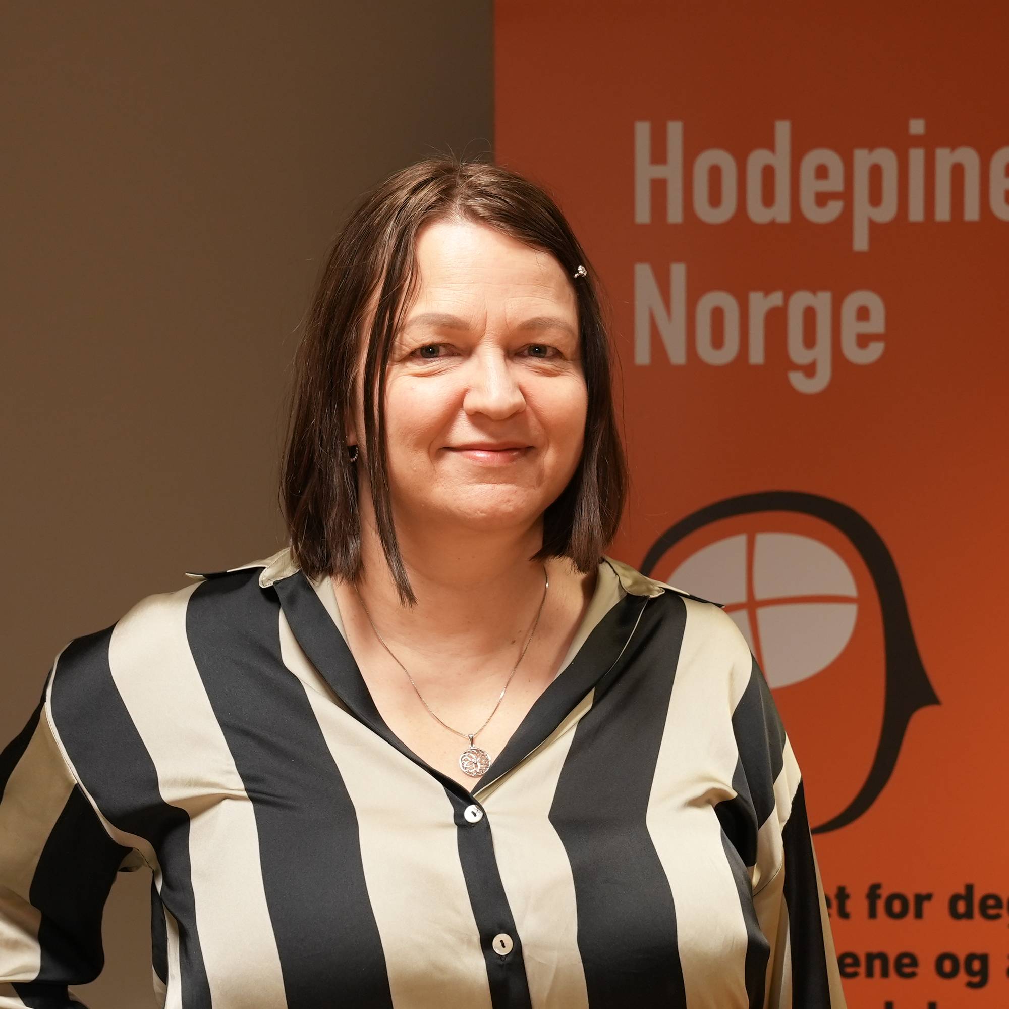 Portrettbilde av Laila Bratterud Mathisen, generalsekretær i Hodepine Norge. 