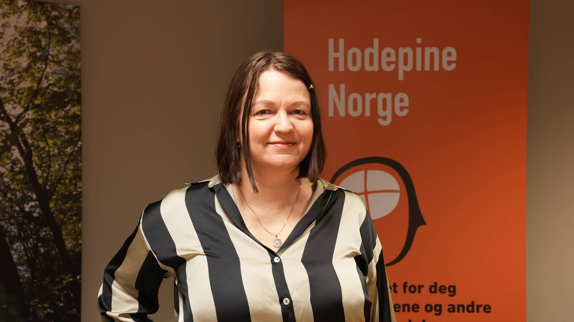 Portrettbilde av Laila Bratterud Mathisen, generalsekretær i Hodepine Norge. 