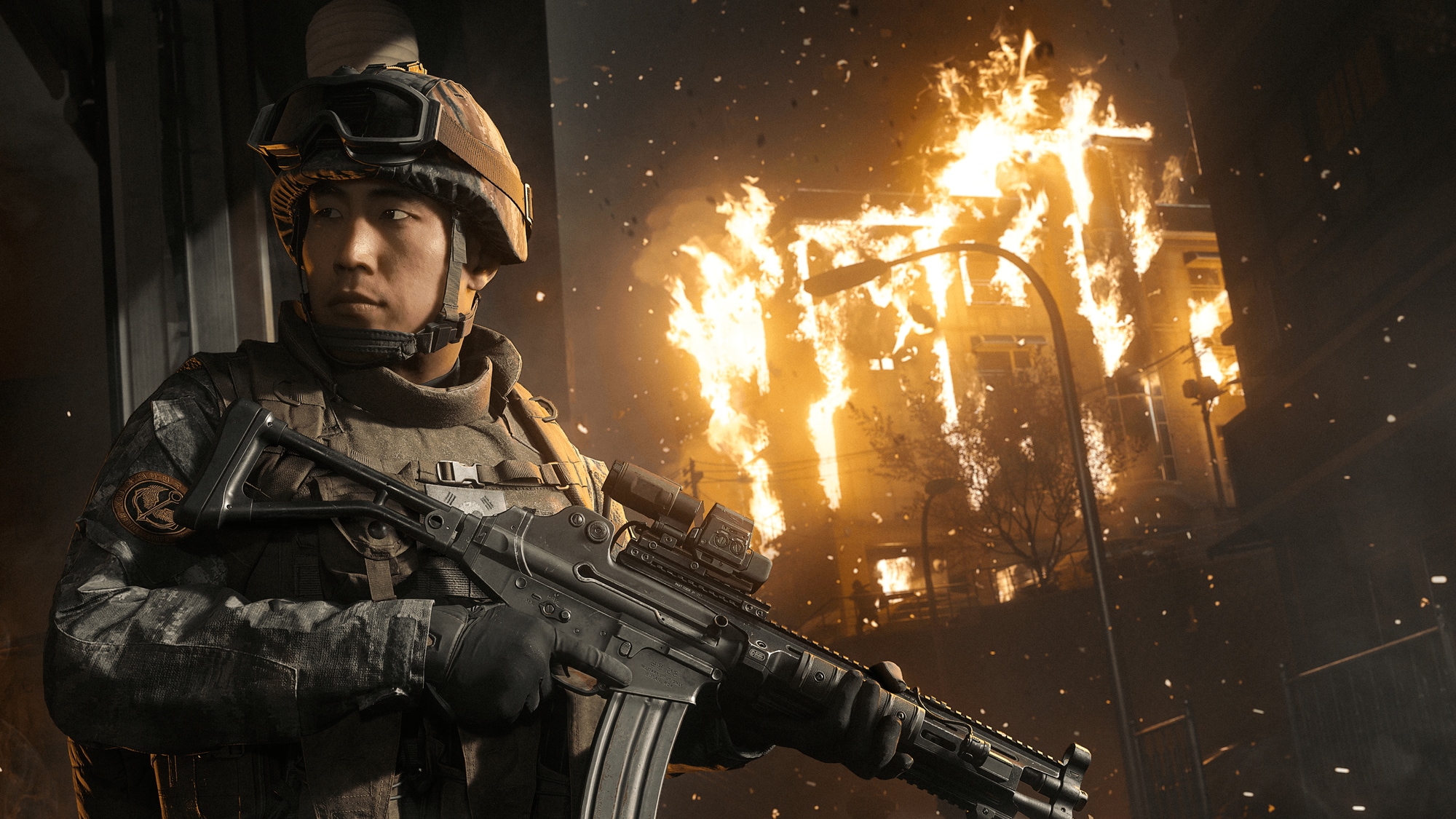 Bilde fra spillet Call of Duty: Modern Warfare 4. En soldat foran en brennende bygning. 