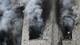 Foto: GENYA SAVILOV / AFP En brannkonstabel ser ut av et utbombet hus i Kyiv 2. januar 2024.