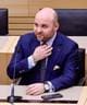 Wolfgang Rattay / REUTERS,NTB En mann i blå dress