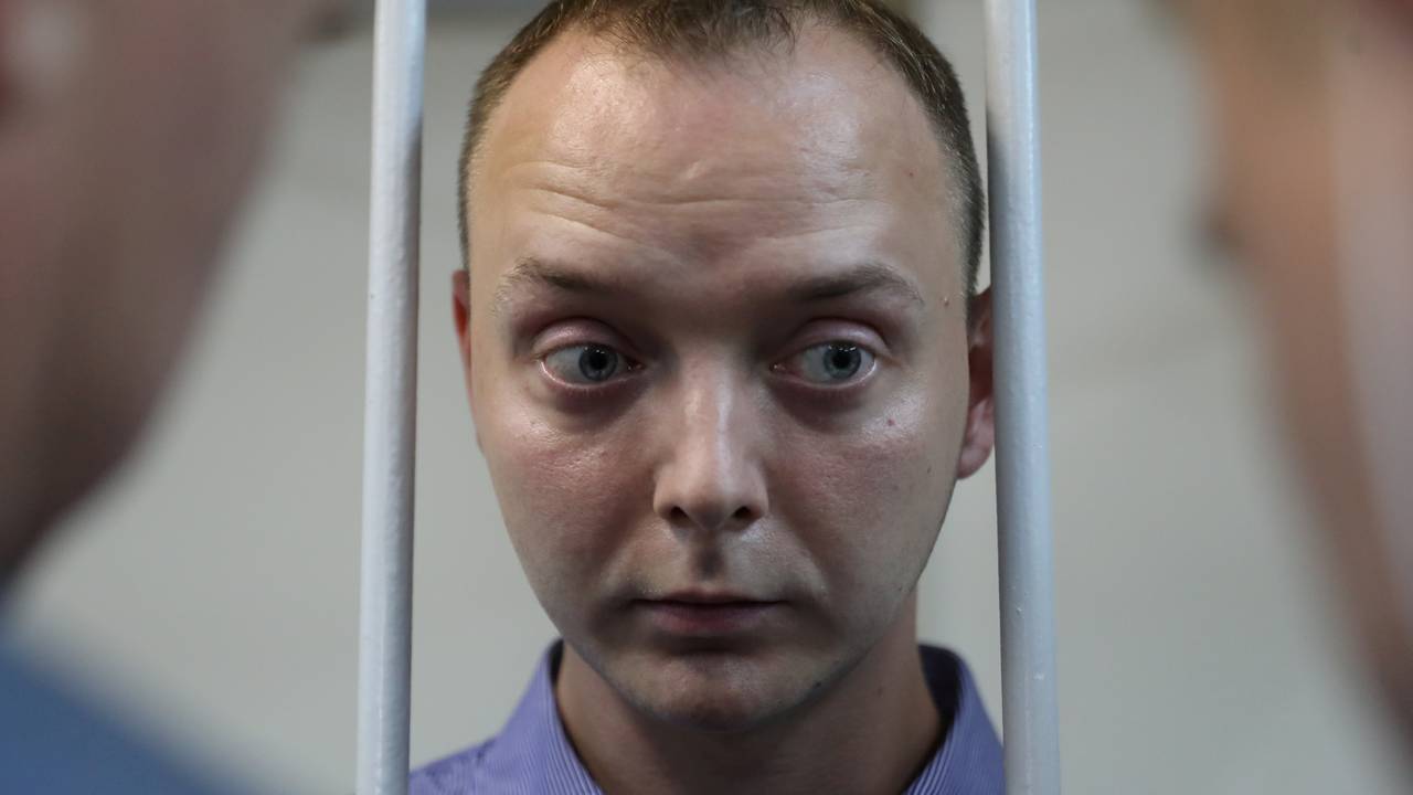 Ivan Safronov, a former journalist who works as an aide to the head of Russia's space agency Roscosmos, detained on suspicion of treason attends a court hearing in Moscow