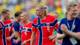 Fredrik Varfjell / NTB Erling Braut Haaland og andre norske fotballspillere i landslagsdrakter på banen. (Bildebeskrivelsen er laget av en KI-tjeneste)