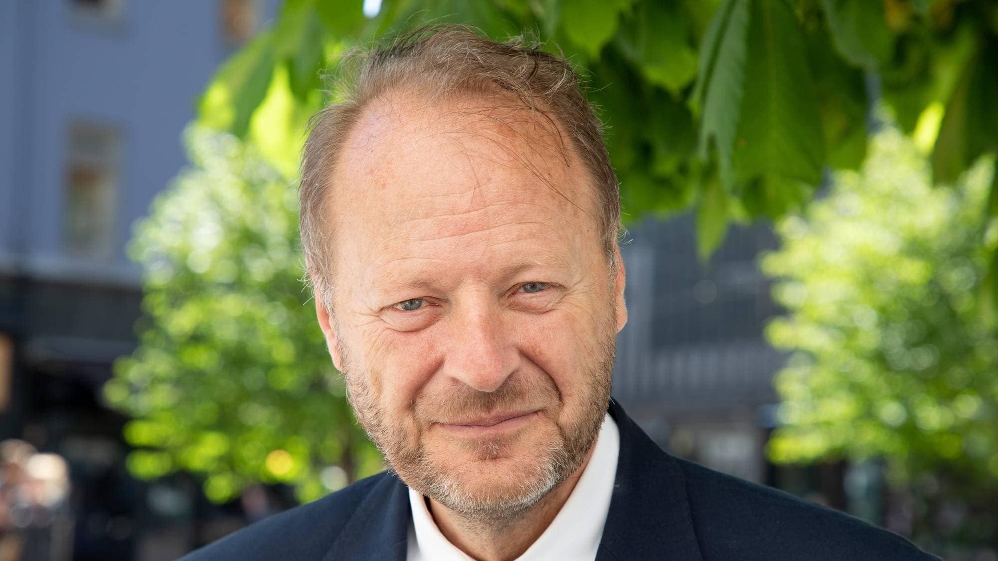 Portrettbilde av advokat Mads Andenæs.
