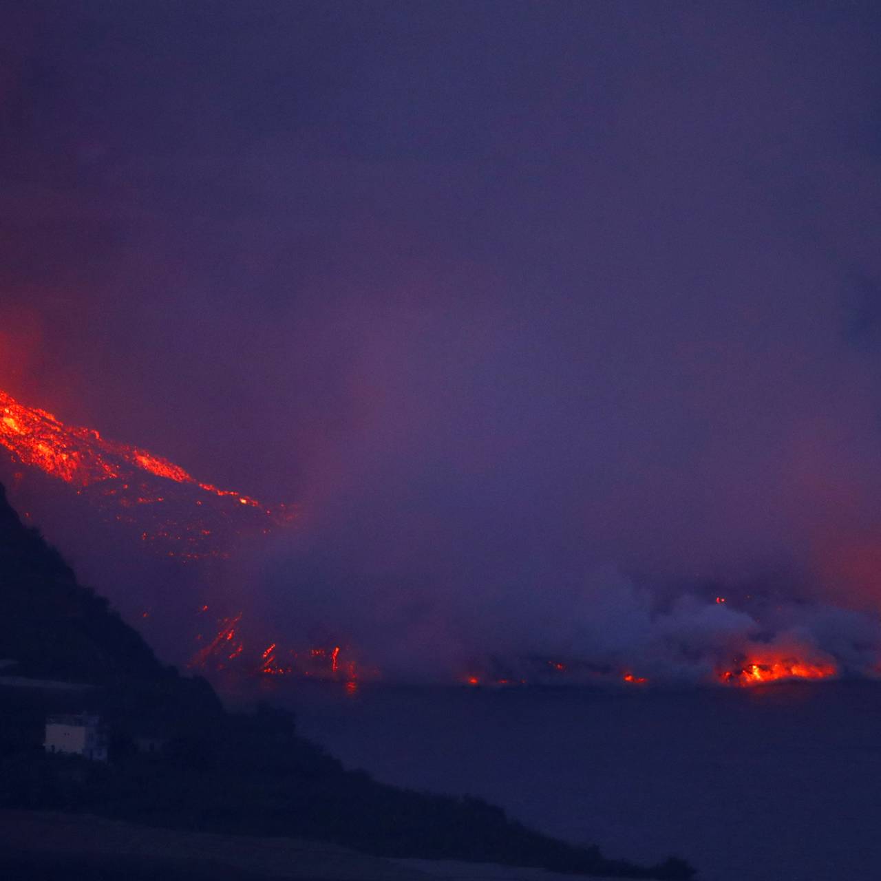 Lava flows following the eruption of a volcano on the Canary Island of La Palma