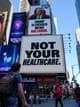 Reuters Anti-Trump reklame på Times Square