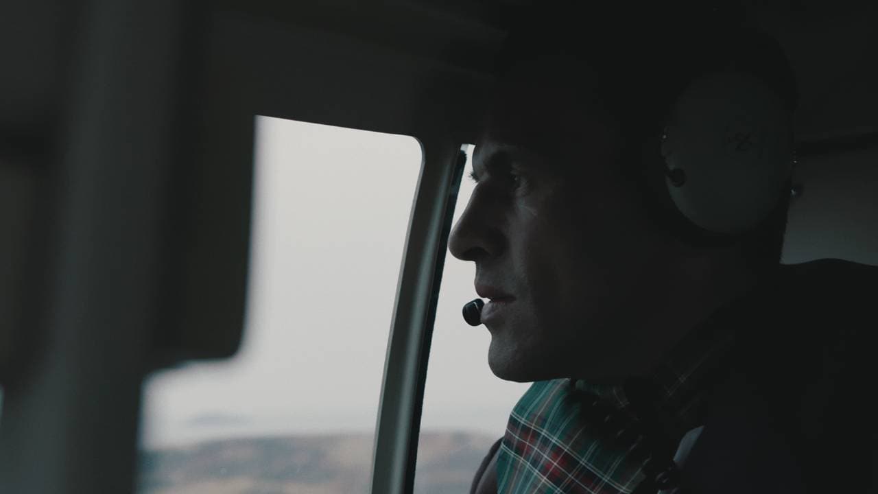 Mr. James sitter i helikopteret