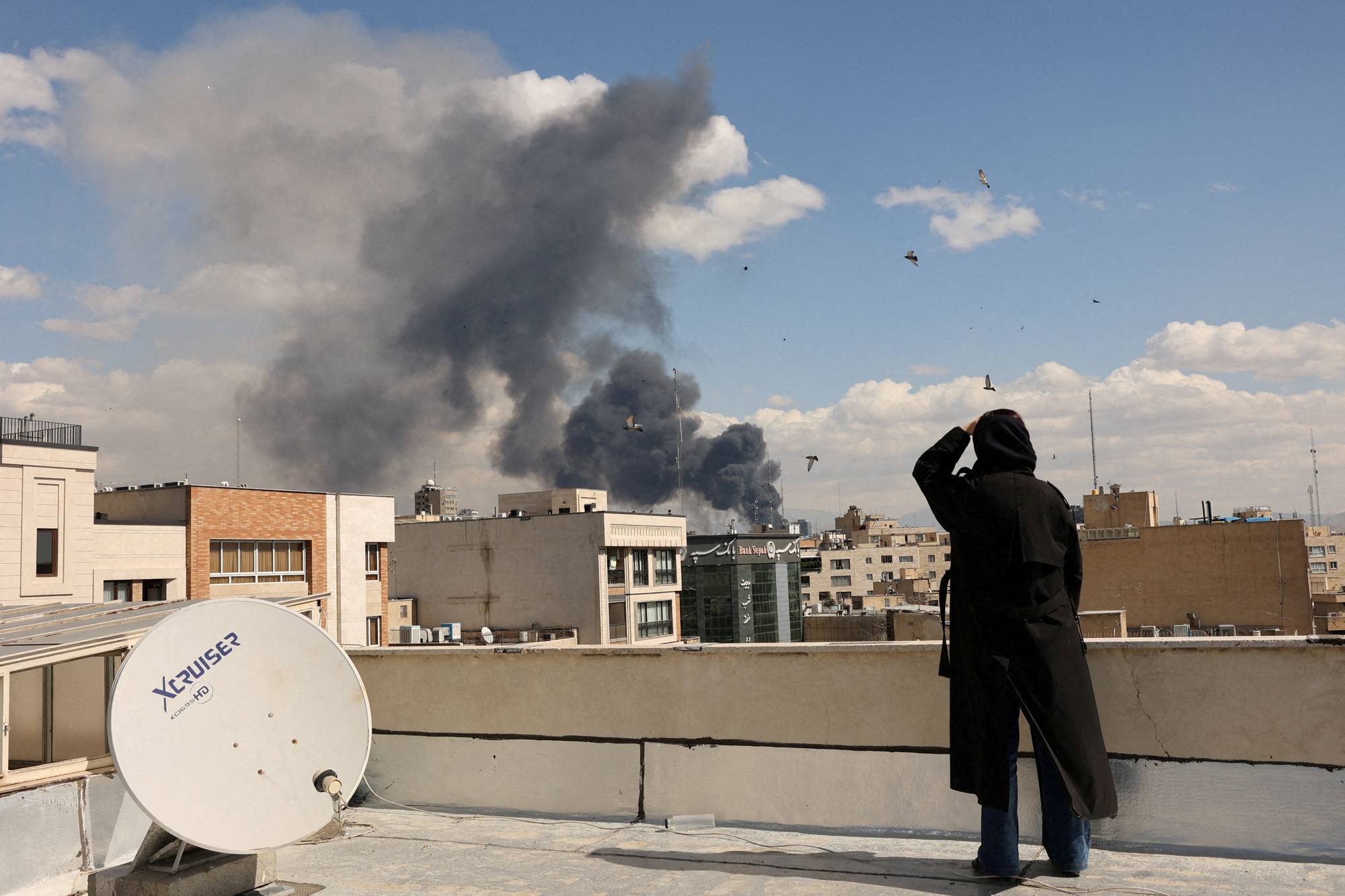 Smoke rises following an explosion, after Israel and the U.S. launched strikes on Iran, in Tehran, Iran, March 1, 2026. Majid Asgaripour/WANA (West Asia News Agency) via REUTERS ATTENTION EDITORS - THIS PICTURE WAS PROVIDED BY A THIRD PARTY TPX IMAGES OF THE DAY