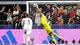 STACY REVERE / GETTY IMAGES NORTH AMERICA,NTB Kroatias keeper redder et skudd fra en motspiller under en fotballkamp. Publikummere ser på. (Bildebeskrivelsen er laget av en KI-tjeneste)
