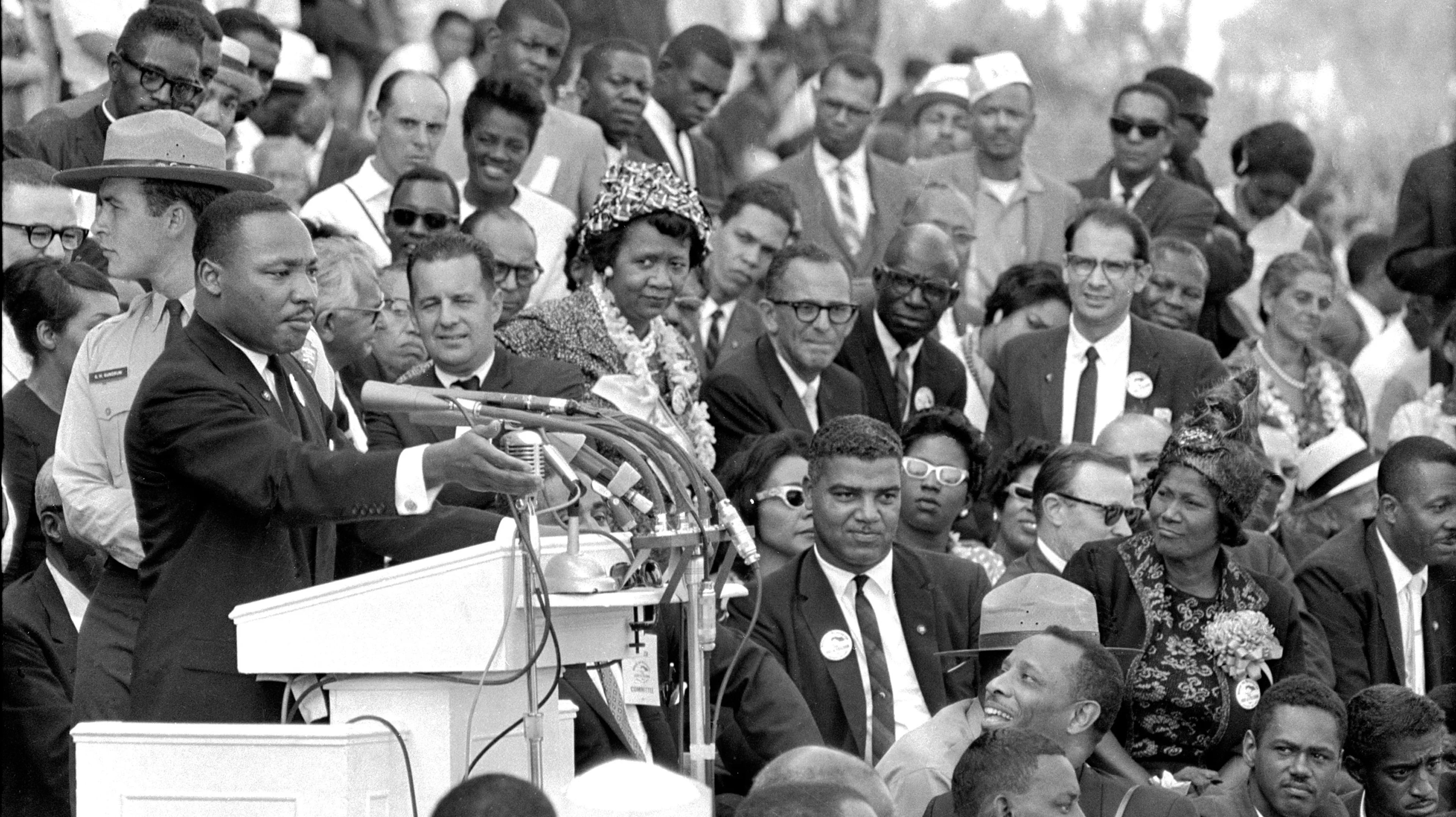 ADVANCE FOR USE MONDAY, JAN. 21, 2013 AND THEREAFTER - FILE - In this Aug. 28, 1963 file photo, the Rev. Dr. Martin Luther King Jr., head of the Southern Christian Leadership Conference, speaks to thousands during his "I Have a Dream" speech in front of the Lincoln Memorial for the March on Washington for Jobs and Freedom in Washington. Actor-singer Sammy Davis Jr. is at bottom right. It has been cited as one of America's essential ideals, its language suggestive of a constitutional amendment on equality: People should "not be judged but he color of their skin but by the content of their character." Yet 50 years after the King's monumental statement, there is considerable disagreement over what this quote means when it comes to affirmative action and other measures aimed at helping the disadvantaged. (AP Photo/File)