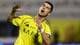Hamad I Mohammed / REUTERS,NTB Fotballspilleren Cristiano Ronaldo med ansiktet mot himmelen og hendene løftet. Han bærer en gul trøye med sponsornavn. Bakgrunnen er uskarpt. (Bildebeskrivelsen er laget av en KI-tjeneste)