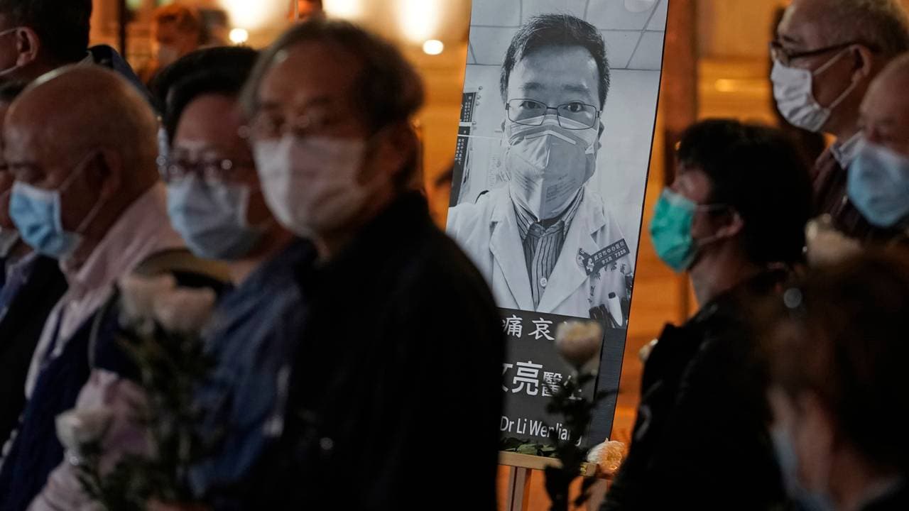 Attendees wore face masks during a memorial service for Li Wenliang in Hong Kong on February 7. 