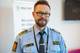 Christian Nygaard-Monsen / NRK en mann med kort hår, skjedd og briller iført politiuniform