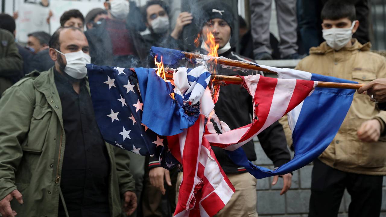 Protesters in Tehran burn the US and Israeli flags after the assassination of Mohsen Fakhrizadeh.  November 28. 