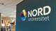 TARIQ ALISUBH Bilde av banner der det står «Nord universitet».