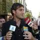 AP Former Inter Milan player Christian Vieri receives media attention after being questioned in Rome Friday, Oct. 27, 2006, by Francesco Saverio Borrelli, who is leading the investigations carried out by the Italian soccer federation on the alleged wiretapping and tailing of the striker. (AP Photo/Giuseppe Calzuola)