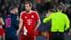 Foto: Carina Johansen / NTB Harry Kane i Bayern München-drakt diskuterer med motspillere og dommer på en fotballbane. (Bildebeskrivelsen er laget av en KI-tjeneste)