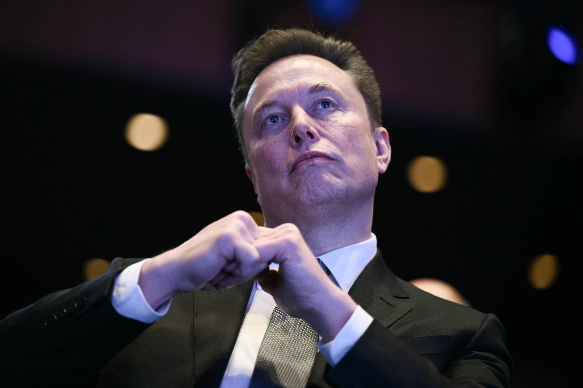 Elon Musk looks on as US President Donald Trump speaks at the US-Saudi Investment Forum at the John F. Kennedy Center for the Performing Arts in Washington, DC on November 19, 2025. Elon Musk's SpaceX has filed confidential papers with US securities regulators to go public, US media reported on April 1, 2026. The filing, which could be the largest initial public offering of all time, puts SpaceX on track to list on a public exchange by July, according to the Wall Street Journal and Bloomberg, which cited people familiar with the matter.