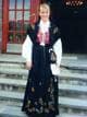 Privat / NTB Mette-Marit Tjessem Høiby i rogalandsbunad står på trappen til Vågsbygd kirke, der hun ble konfirmert i 1988