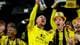Christoffer Andersen / NTB En gruppe mennesker feirer med trofeer under en seremoni. De har på seg gule trøyer og gule hatter. Mange av deltakerne smiler, mens noen holder opp pokaler. Omgivelsene tyder på en sportsbegivenhet med festlig stemning. (Bildebeskrivelsen er laget av en KI-tjeneste)