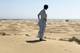 - / AFP / NTB Mann som står ørken.