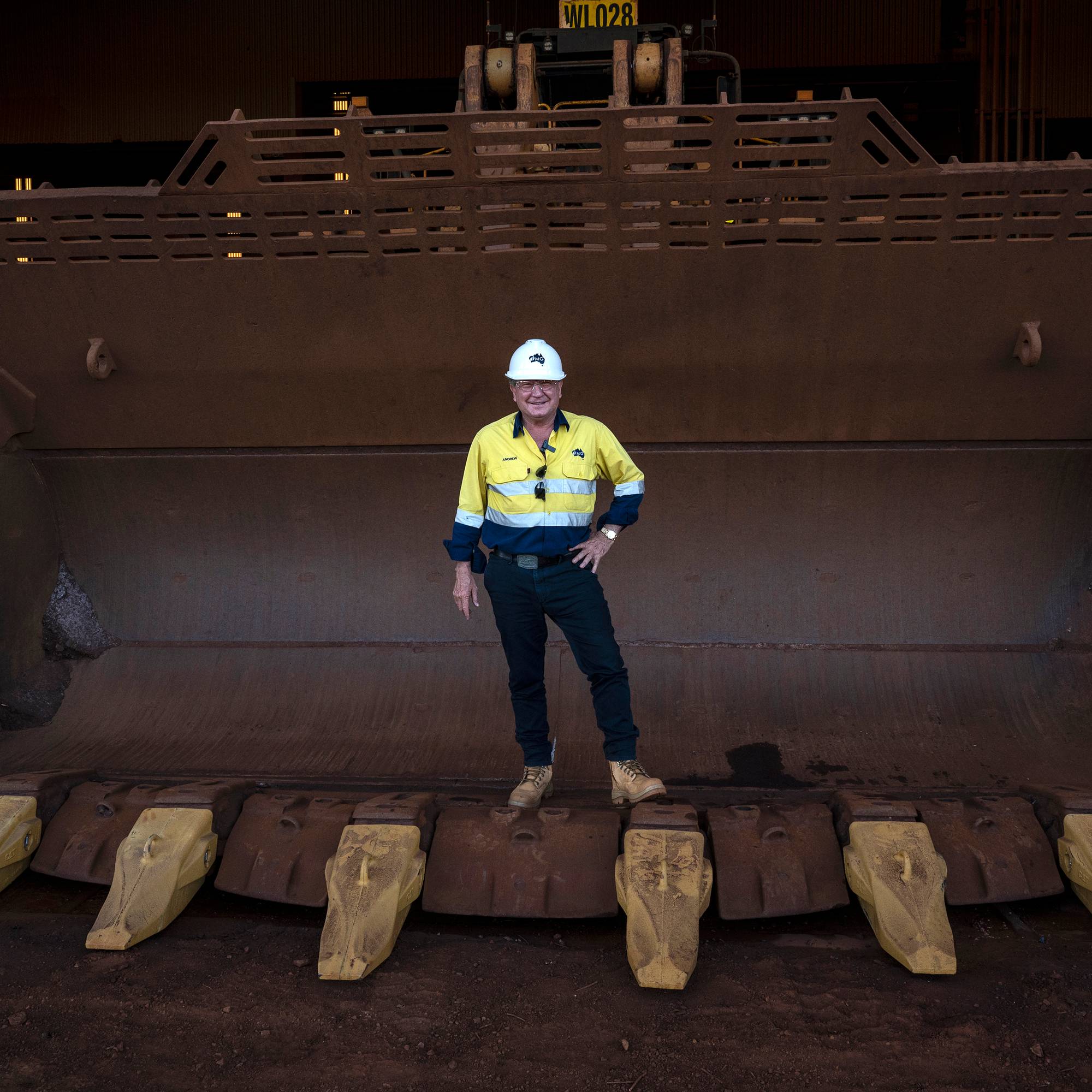 sJE50VAcO0A Andrew Forrest founder of the Fortescue Metals Group poses for a portrait in the bucket of a bulldozer at Cloudbreak Fortescues first mine in Mulga Downs Western Australia on Aug. 21 2021. (David Dare ParkerThe New York Times)