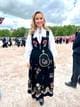 Privat / NRK Ebba Busch i bunad på slottsplassen