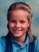 Privat / NTB Mette-Marit Tjessem Høiby, som da var 13 år, ser inn i kamera og smiler. Hun har på seg en denimskjorte og vest.