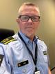 Politiet / NRK Åsbjørn Vikan, avsnittsleiar for økonomi, miljø og arbeidslivskriminalitet iført politiuniform.