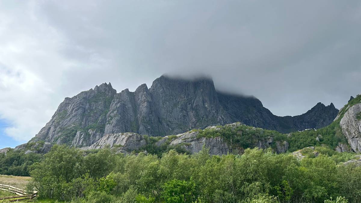 Rescue Mission Underway: Stuck Climber and Tourists in Lofoten Mountains