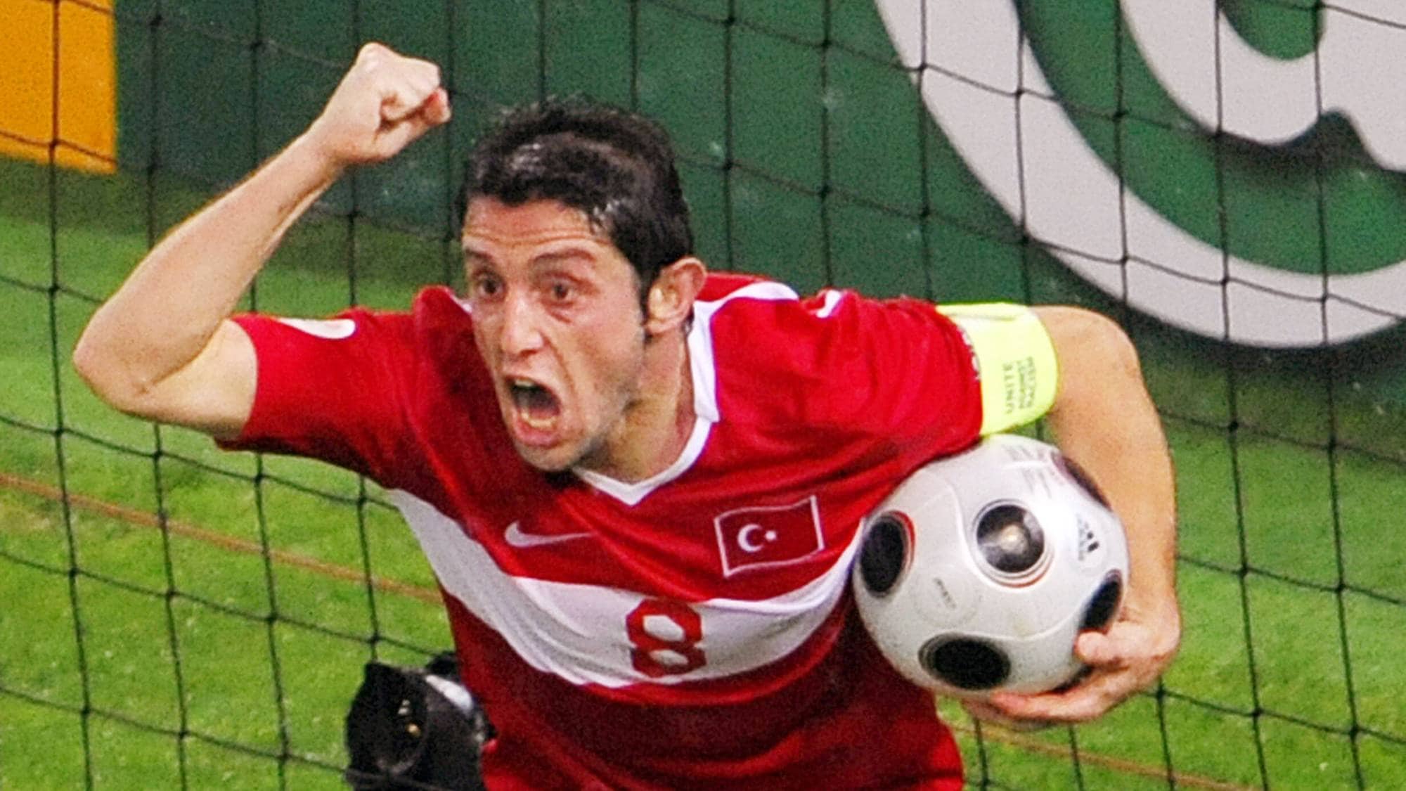 Turkish forward Nihat Kahveci celebrates after scoring his team's second goal during the Euro 2008 final group A match Turkey vs. the Czech Republic on June 15, 2008 at the Stade de Geneve, in Geneva. Turkey won 3-2. AFP PHOTO / FABRICE COFFRINI -- MOBILE SERVICES OUT --