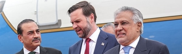 (FILES) US Vice President JD Vance (C) speaks with Army Chief and Field Marshal Syed Asim Munir (L) and Pakistan's Foreign Minister Ishaq Dar after arriving for the US-Iran peace talks in Islamabad on April 11, 2026. Over a feverish few days of diplomacy, Pakistan's military and civilian politicians successfully divided the Middle East between them to push for a second round of US-Iran peace talks expected to take place in Islamabad this week. (Photo by Jacquelyn MARTIN / POOL / AFP)