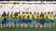 Foto: Yuki Iwanmura / AP,NTB Brasil-landslaget i fotball poserer for bilde før kamp. De står oppstilt på en gressbane med tribuner fulle av tilskuere i bakgrunnen. Spillerne er kledd i gule trøyer og blå shorts. (Bildebeskrivelsen er laget av en KI-tjeneste)