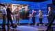 Foto: Tommy Iversen / NRK Et panel med fem mennesker står klare før Debatten-sending i et studio. Programleder ser ned i papirene sine.