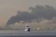 FADEL SENNA / AFP / NTB Røyk stiger fra havnen i Jebel Ali