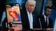 AFP Et LEGO-kart av Iran og en LEGO-figur av Trump. Donald Trump og Pete Hegseth vises i bakgrunnen.