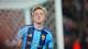 Magnus Lejhall / TT / Magnus Lejhall,NTB Fotballspiller i Djurgården-drakt jubler foran et mål på en fotballbane. (Bildebeskrivelsen er laget av en KI-tjeneste)