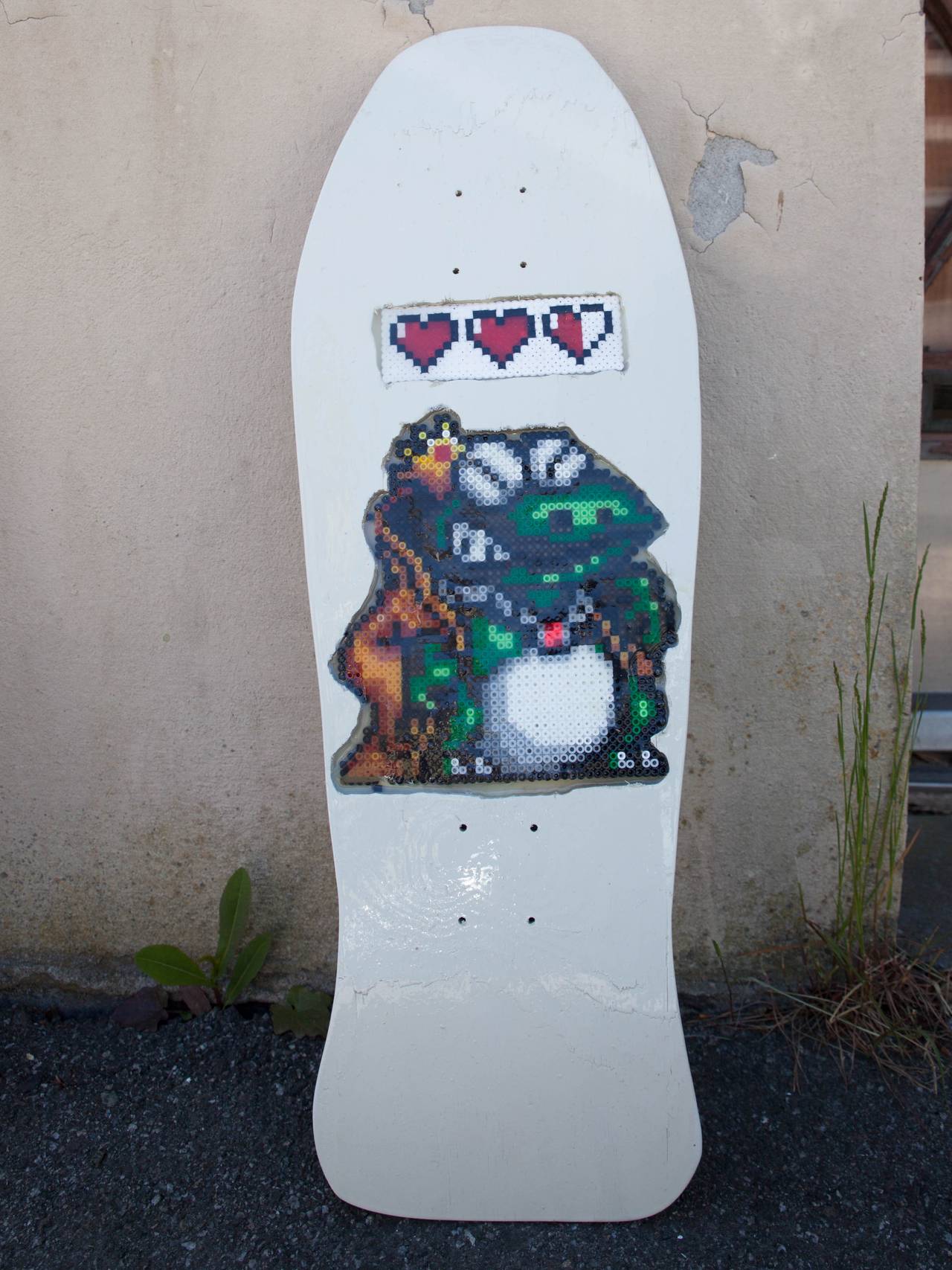 Frosk på hvitt skateboard