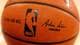 Jason DeCrow / FR103966 AP,NTB Et nærbilde av en Spalding basketball med NBA-logoen og Adam Silvers signatur. Teksten "OFFICIAL GAME BALL" er også synlig. Ballen ligger på et lysebrunt underlag, trolig et parkettgulv. (Bildebeskrivelsen er laget av en KI-tjeneste)