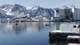 Trond-Erlend Willassen / Nordland fylkeskommune Havn med båter omkranset av snødekte fjell.