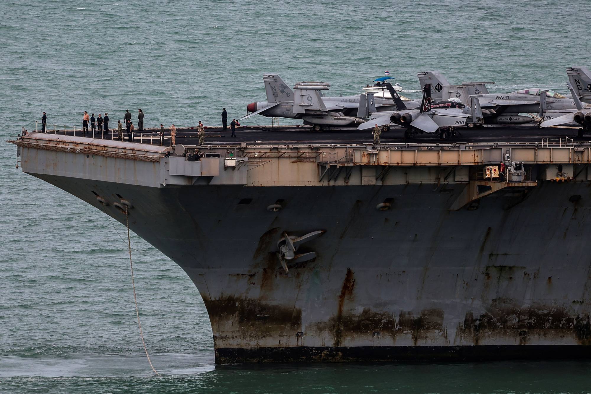 The U.S. Navy Nimitz-class aircraft carrier USS Abraham Lincoln sails toward Laem Chabang Port before docking